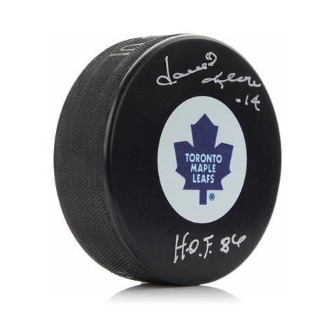 Dave Keon a signé la rondelle des Maple Leafs de Toronto